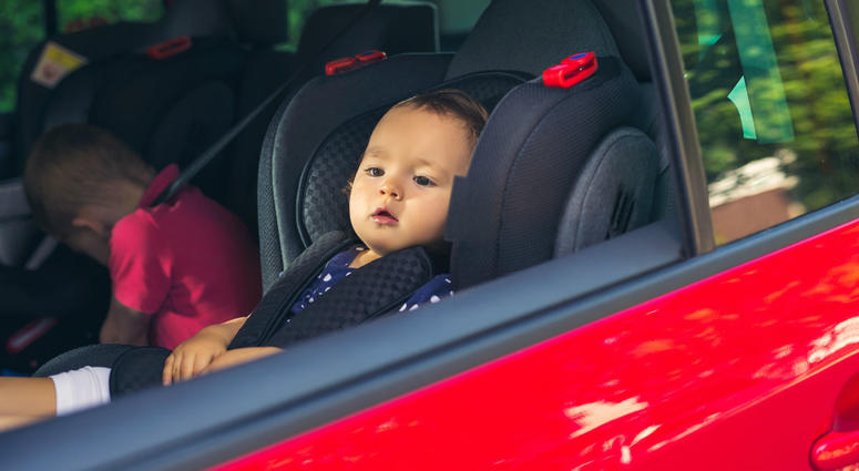 child in a car seat child in a car seat