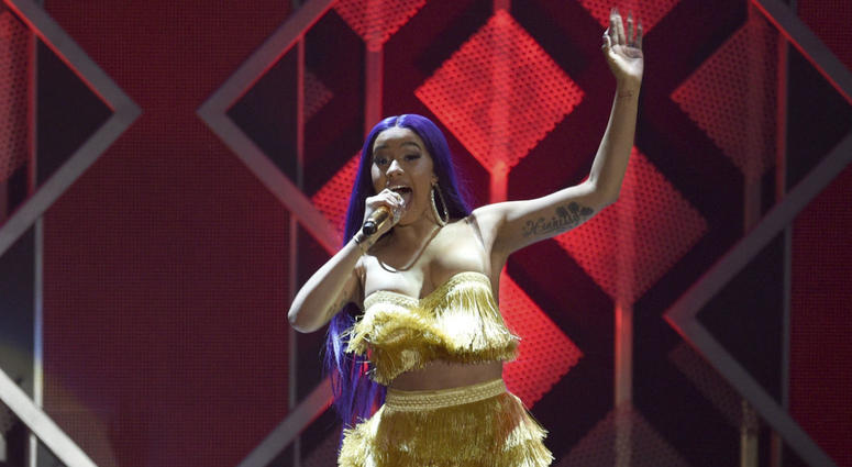 In this Nov. 30, 2018 file photo, Cardi B performs at Jingle Ball at The Forum in Inglewood, Calif. In this Nov. 30, 2018 file photo, Cardi B performs at Jingle Ball at The Forum in Inglewood, Calif.