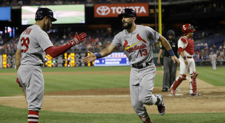 St. Louis Cardinals' Matt Carpenter, center, celebrates with Tommy Pham, left, after Carpenter's go-ahead home run off Philadelphia Phillies relief pitcher Seranthony Dominguez during the ninth inning of a baseball game, June 19, 2018, in Philadelphia. St. Louis Cardinals' Matt Carpenter, center, celebrates with Tommy Pham, left, after Carpenter's go-ahead home run off Philadelphia Phillies relief pitcher Seranthony Dominguez during the ninth inning of a baseball game, June 19, 2018, in Philadelphia.