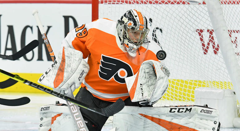 Philadelphia Flyers goaltender Carter Hart (79) makes a save against the Vancouver Canucks during the first period at Wells Fargo Center. Philadelphia Flyers goaltender Carter Hart (79) makes a save against the Vancouver Canucks during the first period at Wells Fargo Center.