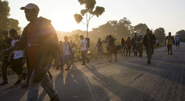 Central American migrants traveling with a caravan to the U.S. make their way to Mapastepec, Mexico, Wednesday, Oct. 24, 2018. Central American migrants traveling with a caravan to the U.S. make their way to Mapastepec, Mexico, Wednesday, Oct. 24, 2018.