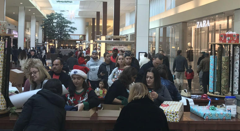 Wrappers at the Cherry Hill Mall are helping to play the role of Santa’s little helpers, for last minute shoppers. Wrappers at the Cherry Hill Mall are helping to play the role of Santa’s little helpers, for last minute shoppers.