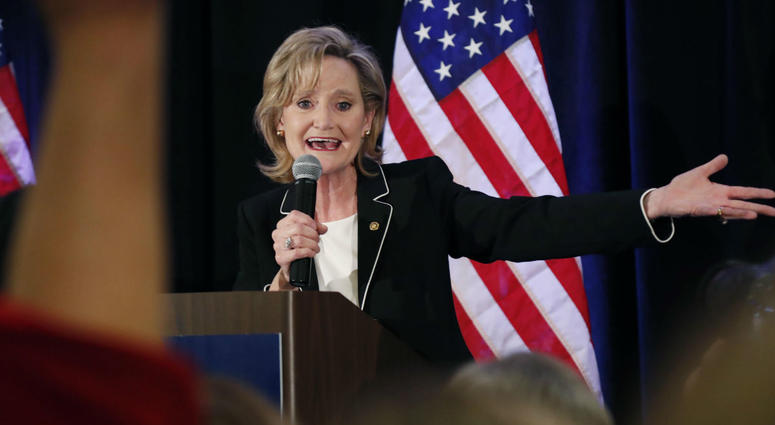 Republican U.S. Sen. Cindy Hyde-Smith calls on her family members to identify themselves as she celebrates her runoff win over Democrat Mike Espy in Jackson, Miss., Tuesday, Nov. 27, 2018. Republican U.S. Sen. Cindy Hyde-Smith calls on her family members to identify themselves as she celebrates her runoff win over Democrat Mike Espy in Jackson, Miss., Tuesday, Nov. 27, 2018.