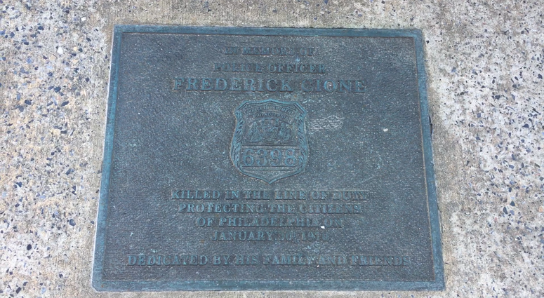 The memorial plaque at the spot where Fred Cione was shot and killed on Oxford Street, in North Philadelphia. Fred Cione memorial