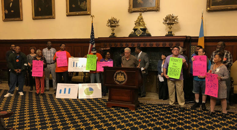 Members of the Transportation Justice Coalition held a press conference at Philadelphia City Hall. Members of the Transportation Justice Coalition