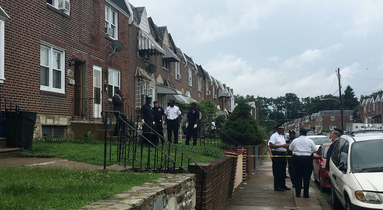 Sources say a police officer shot and killed his wife and himself in a home on this block in North Philadelphia Sources say a police officer shot and killed his wife and himself in a home on this block in North Philadelphia