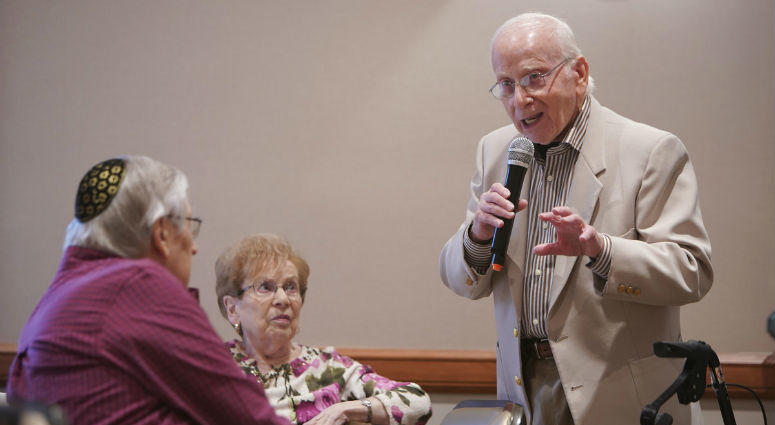 A mysterious hacker contacted 82-year-old Ed Eisen (standing) saying they had video of him watching porn — but he's getting the last chuckle. Ed Eisen
