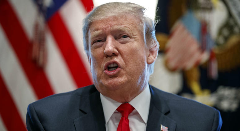 In this Feb. 1, 2019, photo, President Donald Trump speaks in the Cabinet Room of the White House in Washington. In this Feb. 1, 2019, photo, President Donald Trump speaks in the Cabinet Room of the White House in Washington.