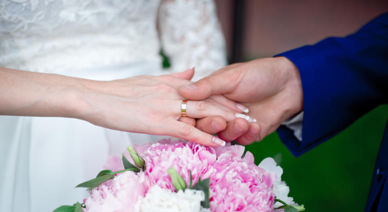The actual age to be legally married in the United States depends on state law. Bride and Groom