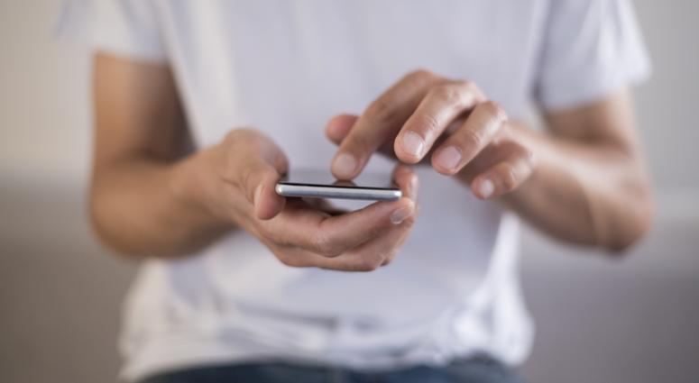millennial using smart phone millennial using smart phone