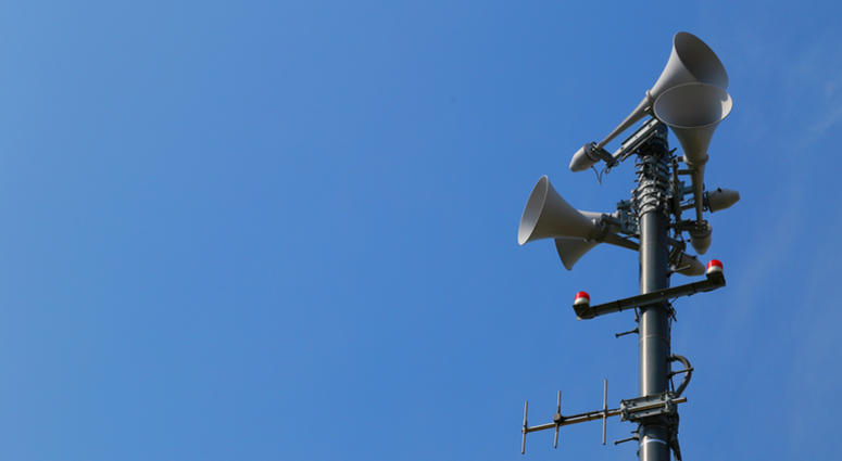 Spectacle of sunny blue sky and outdoor emergency broadcast speaker Spectacle of sunny blue sky and outdoor emergency broadcast speaker