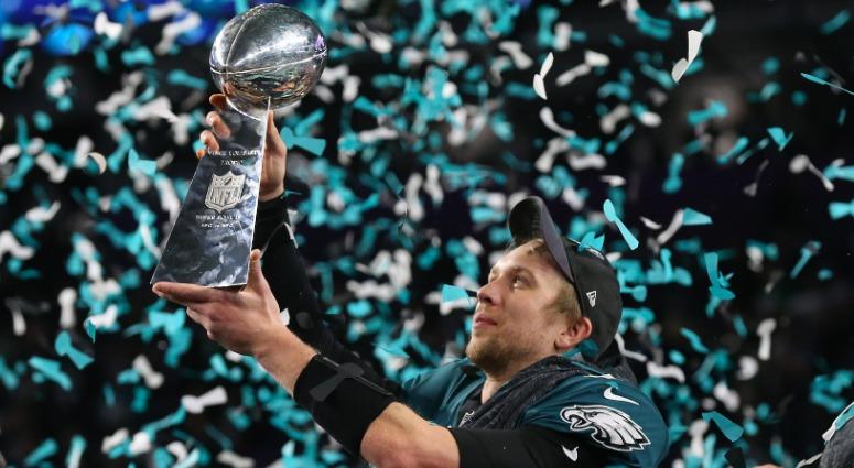 Philadelphia Eagles quarterback Nick Foles (9) hoist the Vince Lombardi Trophy after a victory against the New England Patriots in Super Bowl LII at U.S. Bank Stadium in Minneapolis, Feb. 4, 2018. Nick Foles