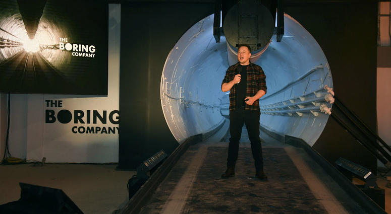 In this Dec. 18, 2018 file photo Elon Musk, co-founder and chief executive officer of Tesla Inc., speaks during an unveiling event for the Boring Co. In this Dec. 18, 2018 file photo Elon Musk, co-founder and chief executive officer of Tesla Inc., speaks during an unveiling event for the Boring Co.