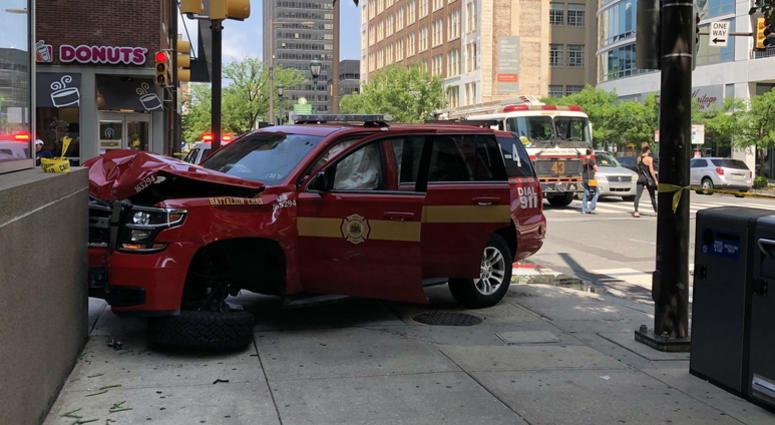 An eye witness tells me a woman trying to beat the light at 21st and Market slammed into this fire department vehicle, which hit a pedestrian before slamming into the building An eye witness tells me a woman trying to beat the light at 21st and Market slammed into this fire department vehicle, which hit a pedestrian before slamming into the building