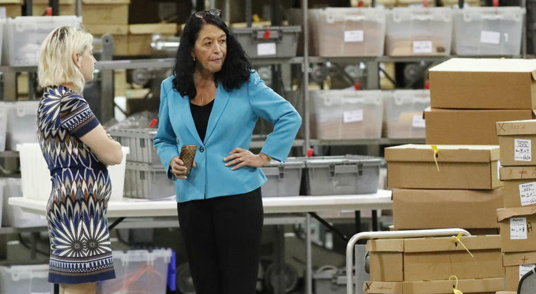 Palm Beach County Supervisor Of Elections Susan Bucher, right, talks to an employee at the Supervisor of Elections office during a recount, Thursday, Nov. 15, 2018, in West Palm Beach, Fla. Palm Beach County Supervisor Of Elections Susan Bucher, right, talks to an employee at the Supervisor of Elections office during a recount, Thursday, Nov. 15, 2018, in West Palm Beach, Fla.