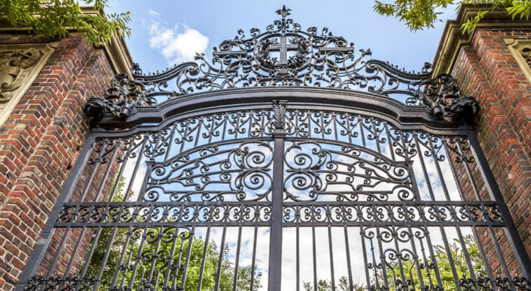 The historic gate of the famous Harvard University in Cambridge, Massachusetts The historic gate of the famous Harvard University in Cambridge, Massachusetts