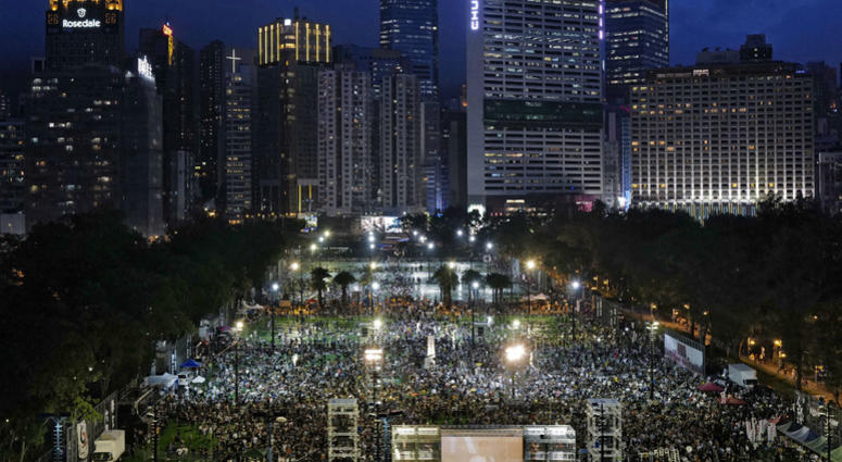 Thousands of people attend a candlelight vigil for victims of the Chinese government's brutal military crackdown three decades ago on protesters in Beijing's Tiananmen Square at Victoria Park in Hong Kong Tuesday, June 4, 2019. Thousands of people attend a candlelight vigil for victims of the Chinese government's brutal military crackdown three decades ago on protesters in Beijing's Tiananmen Square at Victoria Park in Hong Kong Tuesday, June 4, 2019.