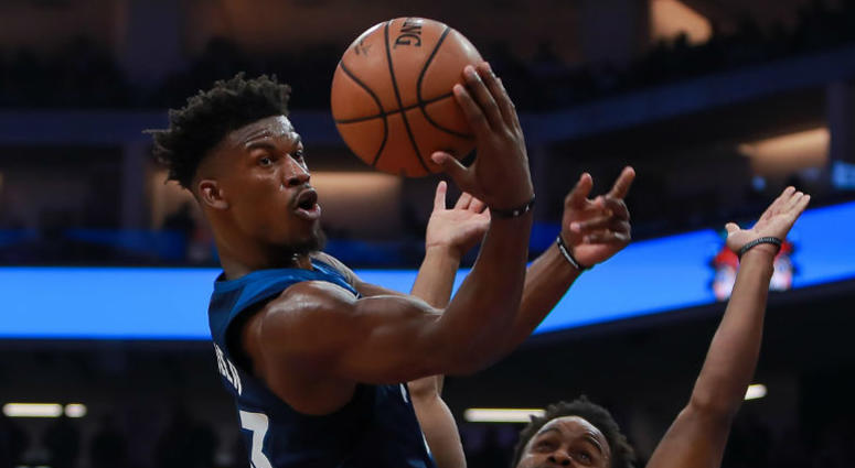 Minnesota Timberwolves guard Jimmy Butler (23) passes the ball against Sacramento Kings guard Yogi Ferrell (3) during the second quarter at Golden 1 Center. Minnesota Timberwolves guard Jimmy Butler (23) passes the ball against Sacramento Kings guard Yogi Ferrell (3) during the second quarter at Golden 1 Center.