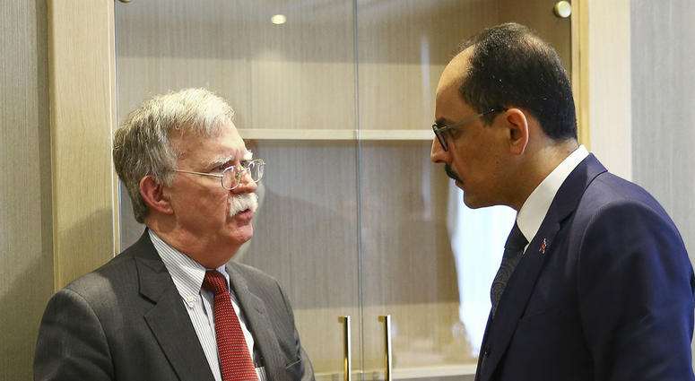 U.S. National Security Adviser John Bolton, left, and his Turkish counterpart and senior adviser to President Recep Tayyip Erdogan, Ibrahim Kalin, right, talk at the Presidential Palace in Ankara, Turkey, Tuesday, Jan. 8, 2019. U.S. National Security Adviser John Bolton, left, and his Turkish counterpart and senior adviser to President Recep Tayyip Erdogan, Ibrahim Kalin, right, talk at the Presidential Palace in Ankara, Turkey, Tuesday, Jan. 8, 2019.