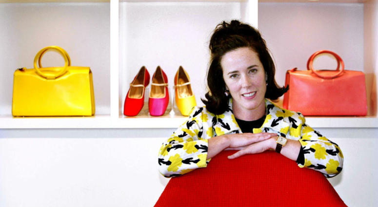 In this May 13, 2004 file photo, designer Kate Spade poses with handbags and shoes from her next collection in New York. designer Kate Spade