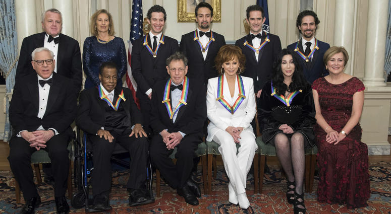 Front row from left: David Rubenstein, Wayne Shorter, Philip Glass, Reba McEntire, Cher, Deborah Rutter; back row from left: Deputy Secretary of State John Sullivan, Grace Rodriguez, Thomas Kail, Lin-Manuel Miranda, Andy Blankenbuehler, and Alex Lacamoire Front row from left: David Rubenstein, Wayne Shorter, Philip Glass, Reba McEntire, Cher, Deborah Rutter; back row from left: Deputy Secretary of State John Sullivan, Grace Rodriguez, Thomas Kail, Lin-Manuel Miranda, Andy Blankenbuehler, and Alex Lacamoire