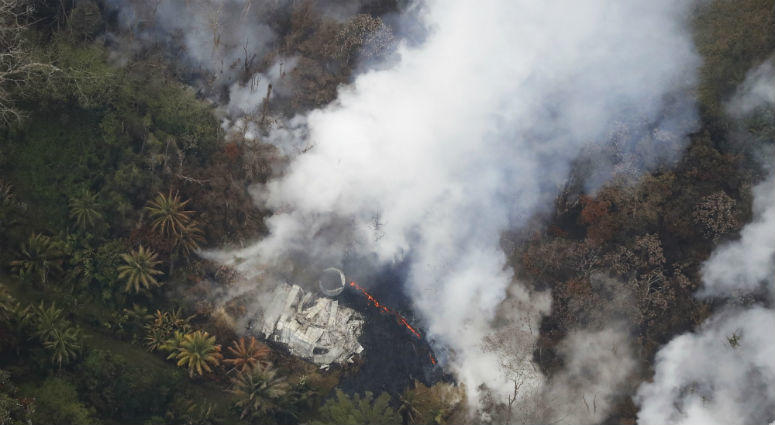 This Wednesday, May 9, 2018, photo shows an aerial view of the East Rift Zone, along which the Leilani Estates neighborhood sits, from the ongoing Kilauea eruption, as seen from a helicopter flying around Pahoa, Hawaii. This Wednesday, May 9, 2018, photo shows an aerial view of the East Rift Zone, along which the Leilani Estates neighborhood sits, from the ongoing Kilauea eruption, as seen from a helicopter flying around Pahoa, Hawaii.