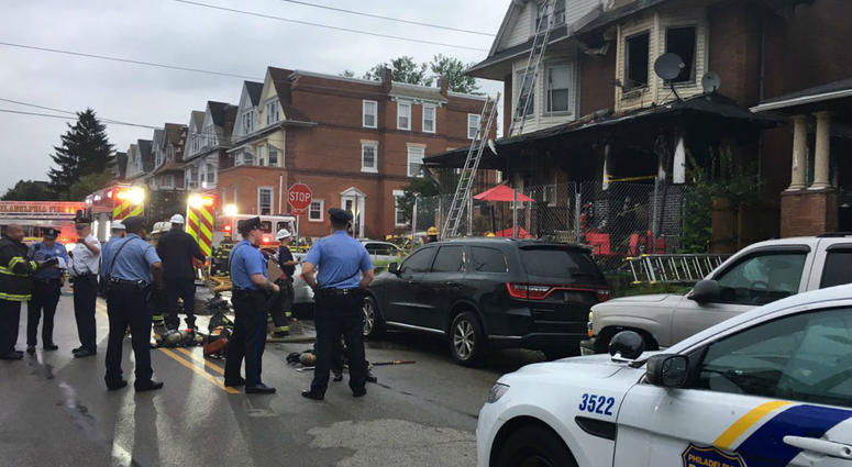 Firefighters report 2 people jumped from upper floors to escape the flames house near 12th and Roscomb streets.. Firefighters report 2 people jumped from upper floors to escape the flames house near 12th and Roscomb streets..