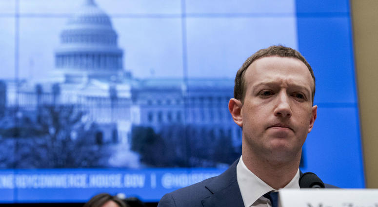 In this April 11, 2018, file photo, Facebook CEO Mark Zuckerberg pauses while testifying before a House Energy and Commerce hearing on Capitol Hill in Washington. In this April 11, 2018, file photo, Facebook CEO Mark Zuckerberg pauses while testifying before a House Energy and Commerce hearing on Capitol Hill in Washington.