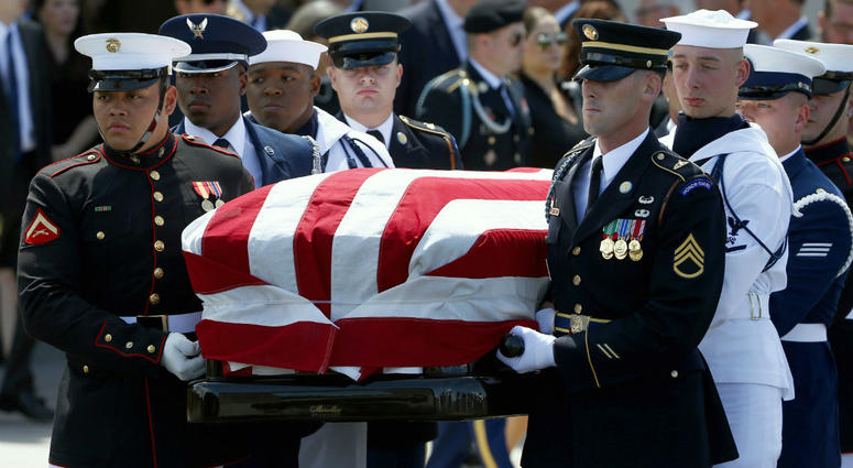 A military honor guard carries the casket of Sen. John McCain, R-Ariz., after a memorial service at North Phoenix Baptist Church Thursday, Aug. 30, 2018, in Phoenix. A military honor guard carries the casket of Sen. John McCain, R-Ariz., after a memorial service at North Phoenix Baptist Church Thursday, Aug. 30, 2018, in Phoenix.