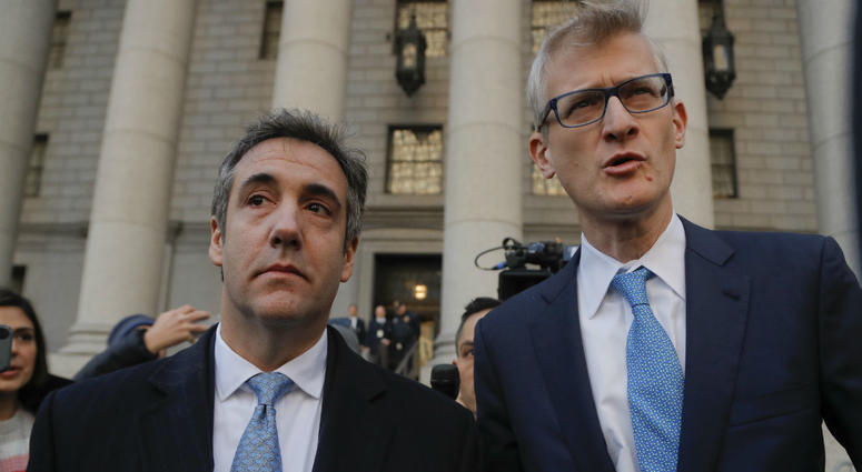 Michael Cohen, left, walks out of federal court with his attorney Guy Petrillo, Thursday, Nov. 29, 2018, in New York. Michael Cohen, left, walks out of federal court with his attorney Guy Petrillo, Thursday, Nov. 29, 2018, in New York.