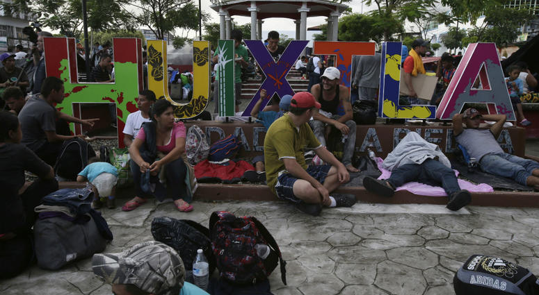 Central American migrants making their way to the U.S. rest in a park after arriving to Huixtla, Mexico, Monday, Oct. 22, 2018. Central American migrants making their way to the U.S. rest in a park after arriving to Huixtla, Mexico, Monday, Oct. 22, 2018.