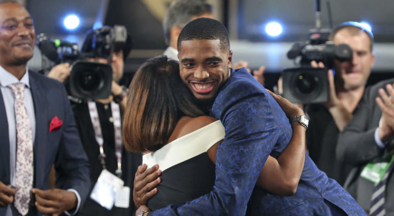 Villanova's Mikal Bridges is greeted by friends and family after he was picked 10th overall by the Philadelphia 76ers during the first round of the NBA basketball draft in New York, Thursday, June 21, 2018. Villanova's Mikal Bridges is greeted by friends and family after he was picked 10th overall by the Philadelphia 76ers during the first round of the NBA basketball draft in New York, Thursday, June 21, 2018.