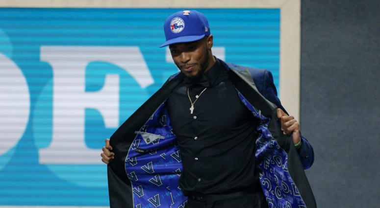 Mikal Bridges (Villanova) walks onto the stage after being selected as the number ten overall pick to the Philadelphia 76ers in the first round of the 2018 NBA Draft at the Barclays Center. Mikal Bridges (Villanova) walks onto the stage after being selected as the number ten overall pick to the Philadelphia 76ers in the first round of the 2018 NBA Draft at the Barclays Center.