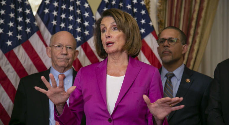 Speaker of the House Nancy Pelosi, D-Calif., flanked by Rep. Peter DeFazio, D-Ore., left, and Rep. Anthony Brown, D-Md., talks to reporters. Speaker of the House Nancy Pelosi, D-Calif., flanked by Rep. Peter DeFazio, D-Ore., left, and Rep. Anthony Brown, D-Md., talks to reporters.