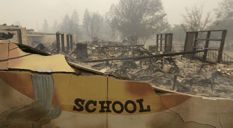 The burned remains of the Paradise Elementary school is seen in a Friday, Nov. 9, 2018 file photo, in Paradise, Calif. The burned remains of the Paradise Elementary school is seen in a Friday, Nov. 9, 2018 file photo, in Paradise, Calif.