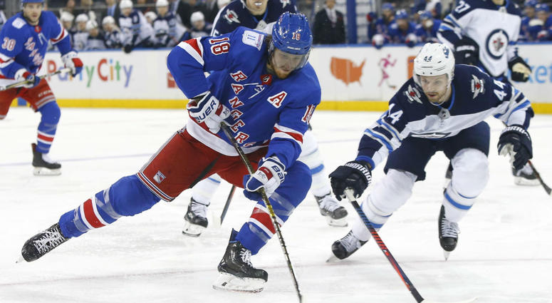 New York Rangers defenseman Marc Staal (18) controls the puck against Winnipeg Jets defenseman Josh Morrissey (44) during the second period of an NHL hockey game, Sunday, Dec. 2, 2018, in New York. New York Rangers defenseman Marc Staal (18) controls the puck against Winnipeg Jets defenseman Josh Morrissey (44) during the second period of an NHL hockey game, Sunday, Dec. 2, 2018, in New York.