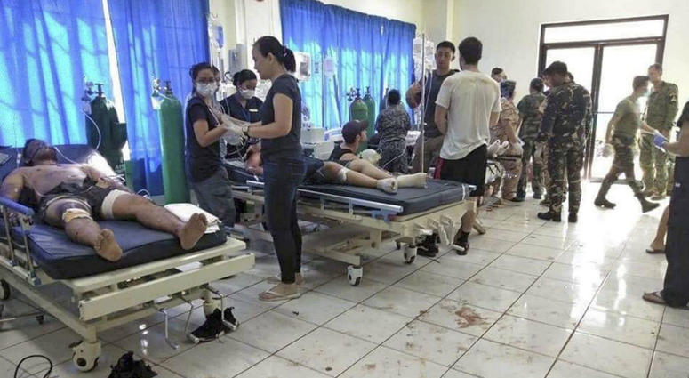 Bomb victims receive treatment in a hospital after two bombs exploded outside a Roman Catholic cathedral in Jolo, the capital of Sulu province in southern Philippines where militants are active Sunday, Jan. 27, 2019. Bomb victims receive treatment in a hospital after two bombs exploded outside a Roman Catholic cathedral in Jolo, the capital of Sulu province in southern Philippines where militants are active Sunday, Jan. 27, 2019.