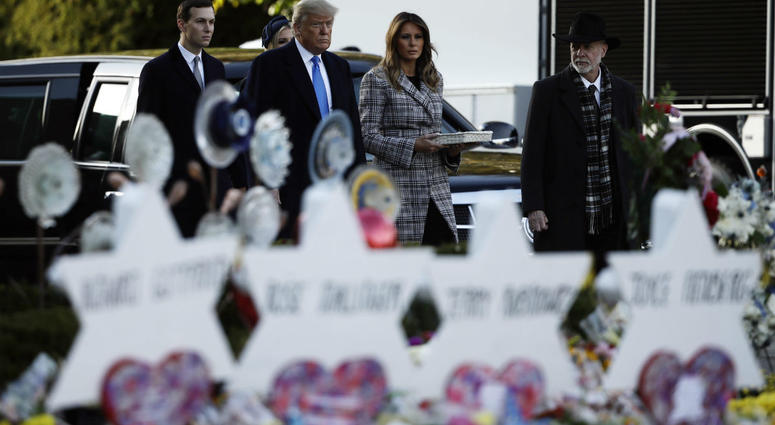 President Donald Trump, first lady Melania Trump, Ivanka Trump and Jared Kushner visit a memorial outside Pittsburgh's Tree of Life Synagogue in Pittsburgh, Tuesday, Oct. 30, 2018. President Donald Trump, first lady Melania Trump, Ivanka Trump and Jared Kushner visit a memorial outside Pittsburgh's Tree of Life Synagogue in Pittsburgh, Tuesday, Oct. 30, 2018.