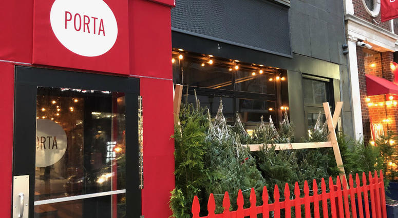 Christmas trees are lined up outside of Porta Philadelphia. Christmas trees are lined up outside of Porta Philadelphia.