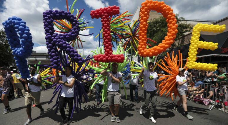 Marchers hold letters spelling out "PRIDE" in balloons during the 48th annual Chicago Pride Parade in Chicago, Ill. on Sunday, June 25, 2017. Marchers hold letters spelling out "PRIDE" in balloons during the 48th annual Chicago Pride Parade in Chicago, Ill. on Sunday, June 25, 2017.