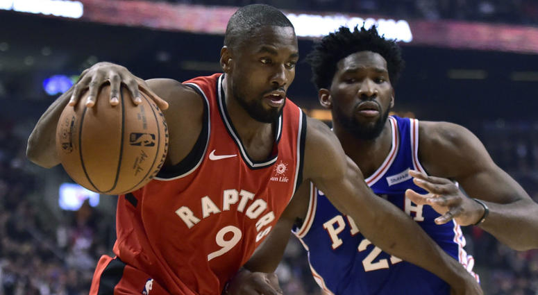 Toronto Raptors forward Pascal Siakam (43) and Philadelphia 76ers guard JJ Redick (17) battle for a loose ball during the second half of an NBA basketball game, Wednesday, Dec. 5, 2018 in Toronto. Toronto Raptors forward Pascal Siakam (43) and Philadelphia 76ers guard JJ Redick (17) battle for a loose ball during the second half of an NBA basketball game, Wednesday, Dec. 5, 2018 in Toronto.