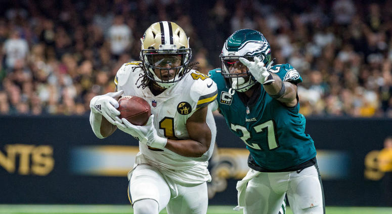 New Orleans Saints running back Alvin Kamara (41) runs the ball against Philadelphia Eagles strong safety Malcolm Jenkins (27) at the Mercedes-Benz Superdome. New Orleans Saints running back Alvin Kamara (41) runs the ball against Philadelphia Eagles strong safety Malcolm Jenkins (27) at the Mercedes-Benz Superdome.