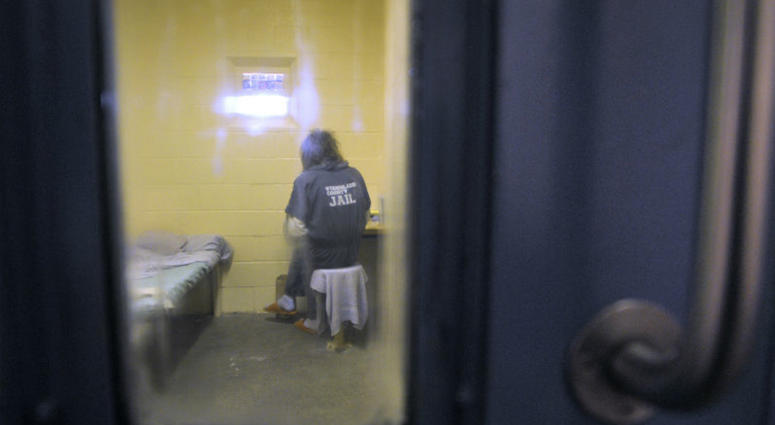 An inmate sits in the B wing for the mentally ill at the Sanislaus County Public Safety Center in Modesto, California, on Nov. 18, 2010. An inmate sits in the B wing for the mentally ill at the Sanislaus County Public Safety Center in Modesto, California, on Nov. 18, 2010.