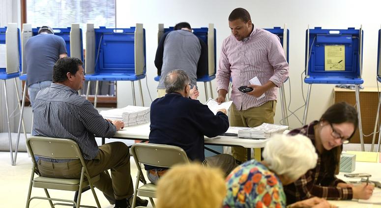 AJ Conklin takes his ballot to vote at the Oakwood Presbyterian Church precinct in State College, Pa., on Tuesday, April 26, 2016. AJ Conklin takes his ballot to vote at the Oakwood Presbyterian Church precinct in State College, Pa., on Tuesday, April 26, 2016.