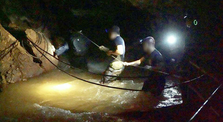 Royal Thai Navy SEALs take part in rescue operation for 12 Thai teenagers and their football coach in northern Thailand's Chiang Rai Province. Thai Cave Rescue