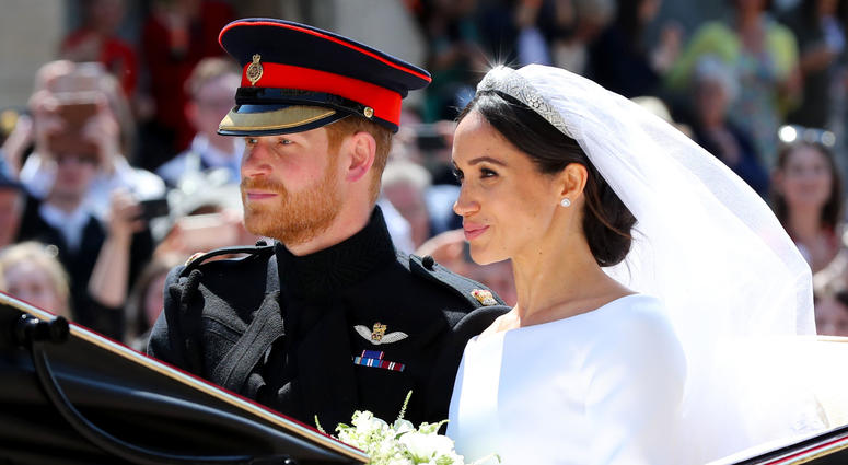 Meghan Markle and Prince Harry leave St George's Chapel at Windsor Castle after their wedding. Meghan Markle and Prince Harry leave St George's Chapel at Windsor Castle after their wedding.