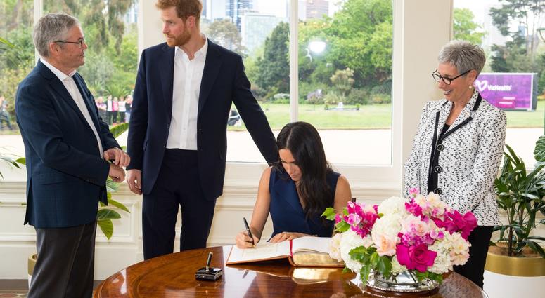 10/19/2018 - The Duke and Duchess of Sussex sign the visitor book at Government House, alongside Governor of Victoria Linda Dessau (right) and her husband Anthony Howard (left) at a reception given by the Governor of Victoria, at Government House. 10/19/2018 - The Duke and Duchess of Sussex sign the visitor book at Government House, alongside Governor of Victoria Linda Dessau (right) and her husband Anthony Howard (left) at a reception given by the Governor of Victoria, at Government House.