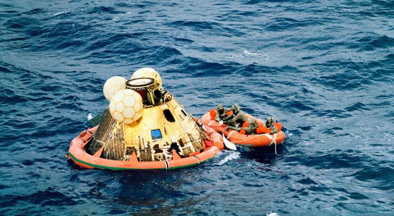 Columbia's hatch is closed with the three crew in the life raft along with Lt. Clancy Hatleberg.. Columbia's hatch is closed with the three crew in the life raft along with Lt. Clancy Hatleberg..