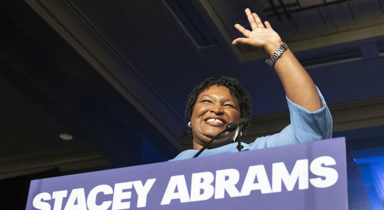 Georgia Democratic gubernatorial candidate Stacey Abrams speaks to supporters about a suspected run-off during an election night watch party, Tuesday, Nov. 6, 2018, in Atlanta. Georgia Democratic gubernatorial candidate Stacey Abrams speaks to supporters about a suspected run-off during an election night watch party, Tuesday, Nov. 6, 2018, in Atlanta.