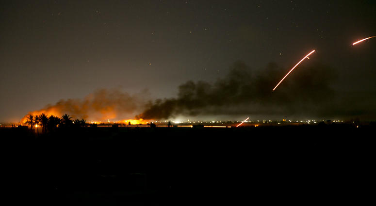 U.S.-backed Syrian Democratic Forces (SDF) fire on Islamic State militant positions in Baghouz, Syria, Monday, March 11, 2019. U.S.-backed Syrian Democratic Forces (SDF) fire on Islamic State militant positions in Baghouz, Syria, Monday, March 11, 2019.